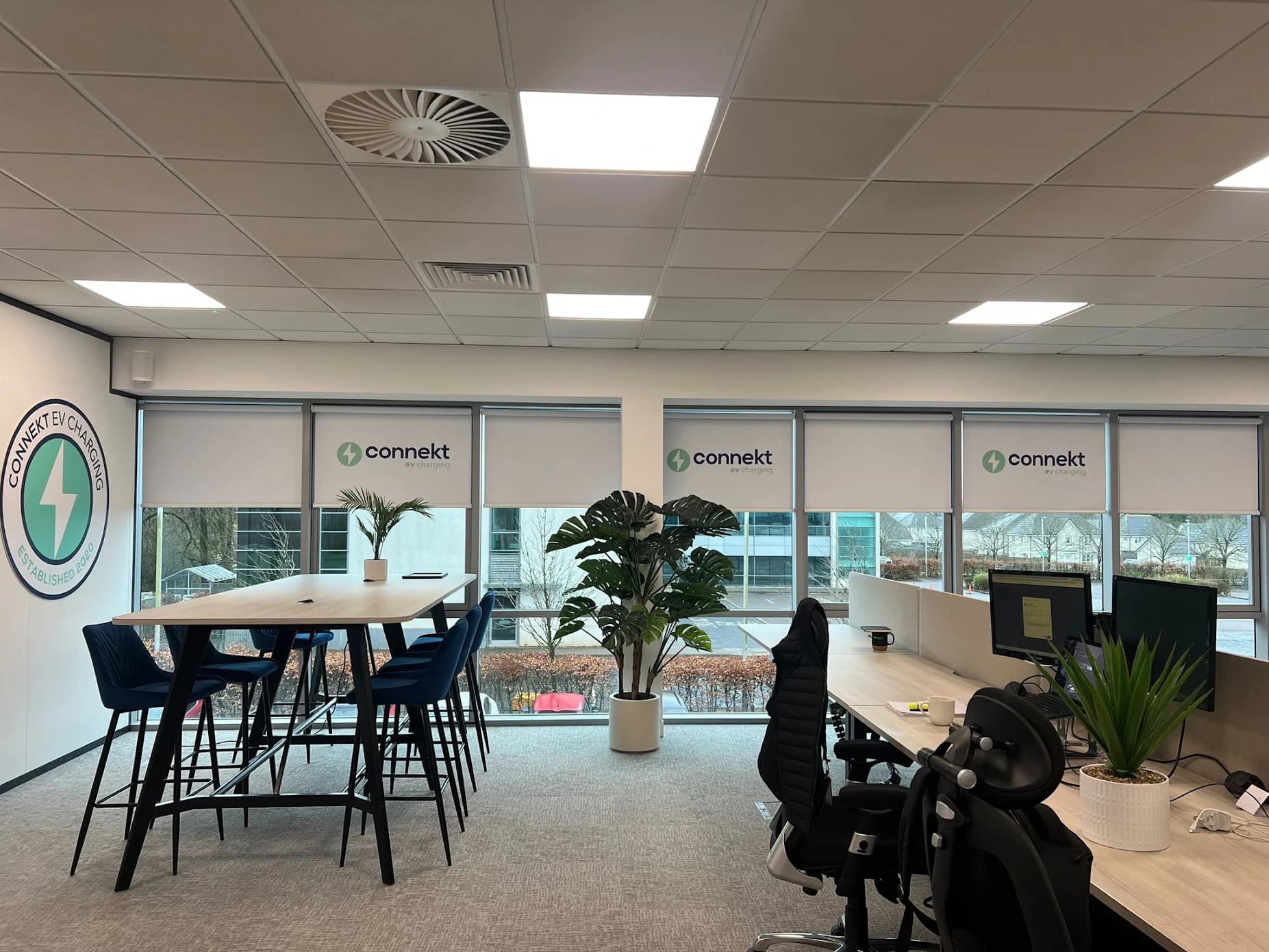 Connekt EV Charging office fitted with multiple printed roller blinds