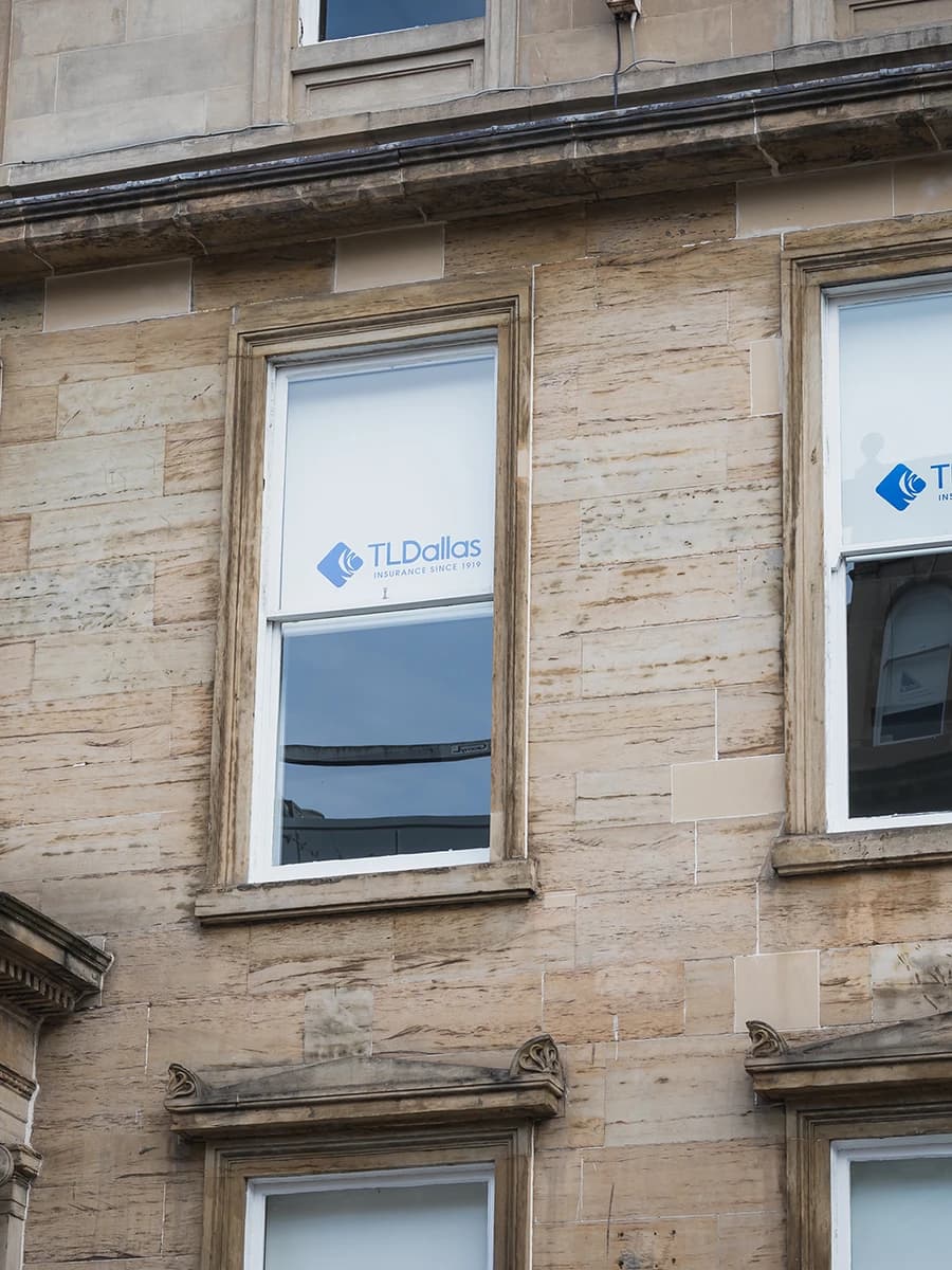 TL Dallas Insurance corporate office with custom logo printed window blinds
