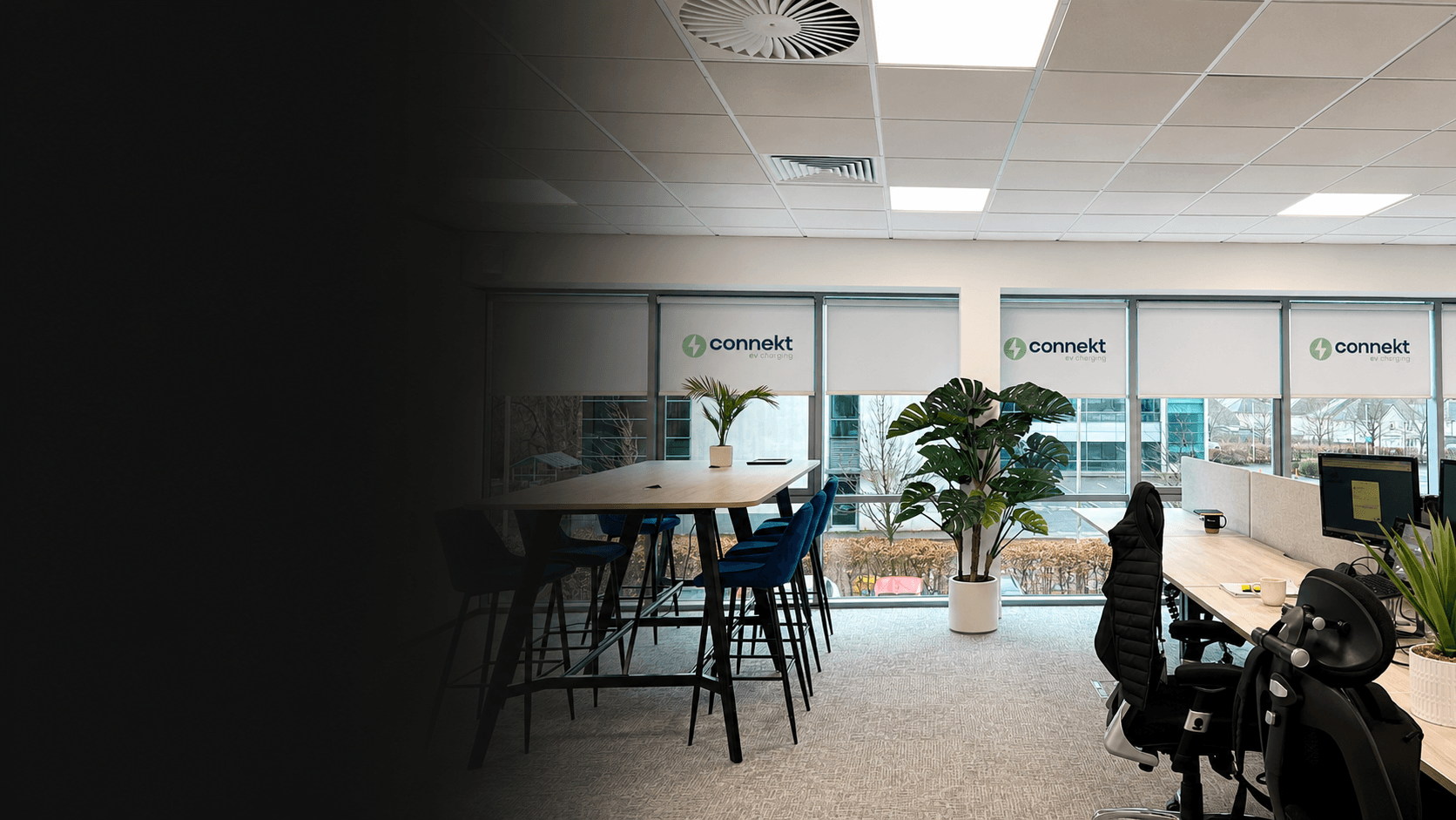 Connekt EV Charging custom logo printed roller blinds in open-plan corporate office