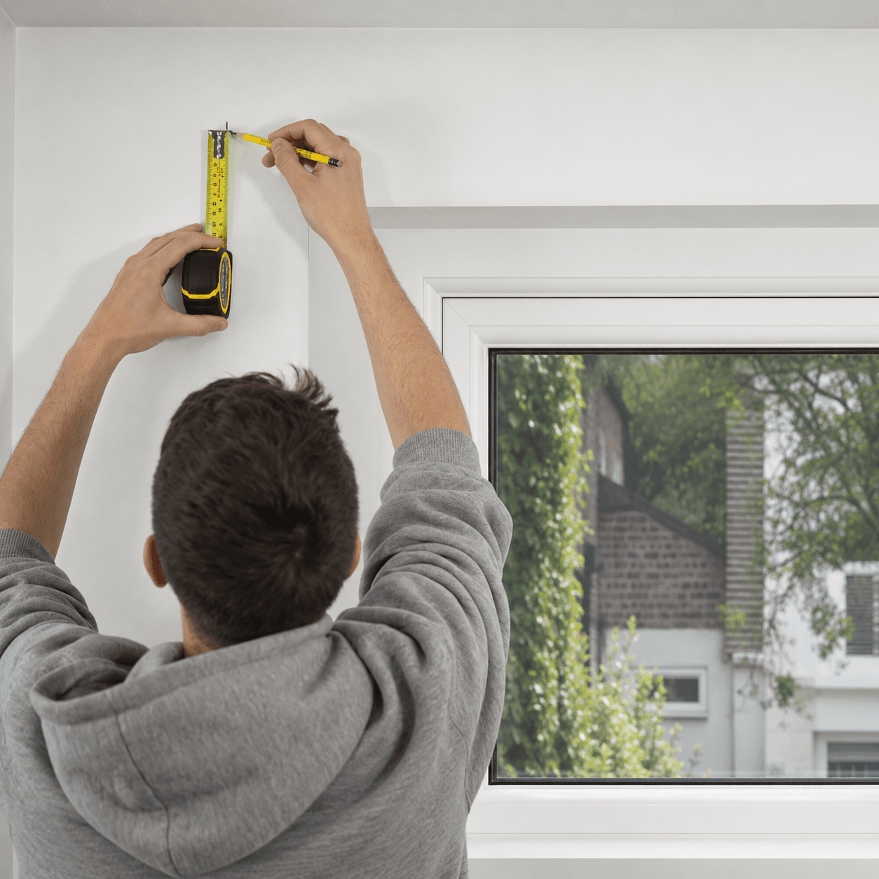 Position and mark the headbox above window recess