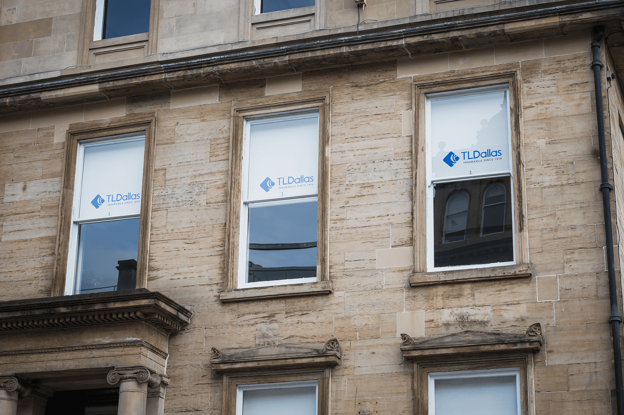 TL Dallas corporate office exterior printed roller blinds in Glasgow